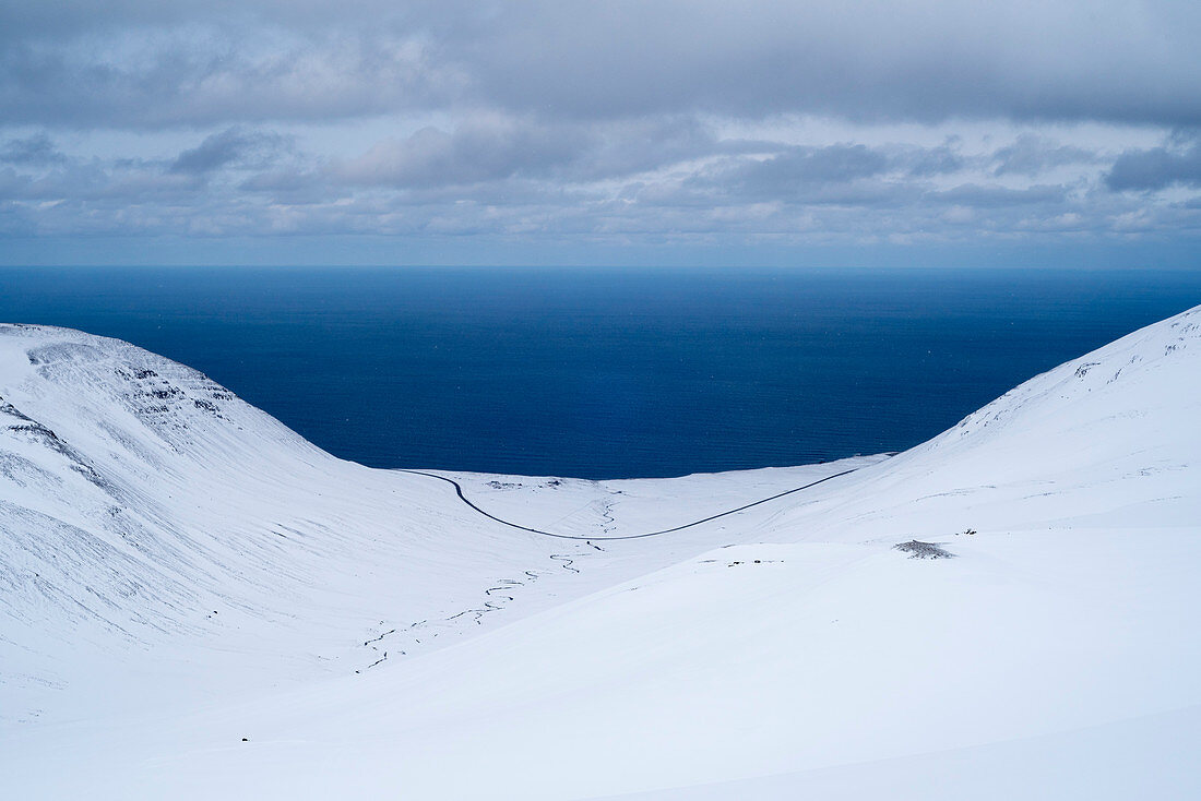 View of the valley named Mánárdalur towards the open Greenland Sea near Siglufjörður, Tröllaskagi or in English Troll Peninsula, Iceland