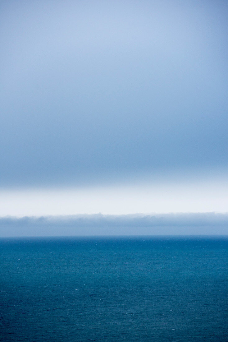 Clouds and fog banks in the Greenland Sea near the island of Spitsbergen, Svalbard, Norway