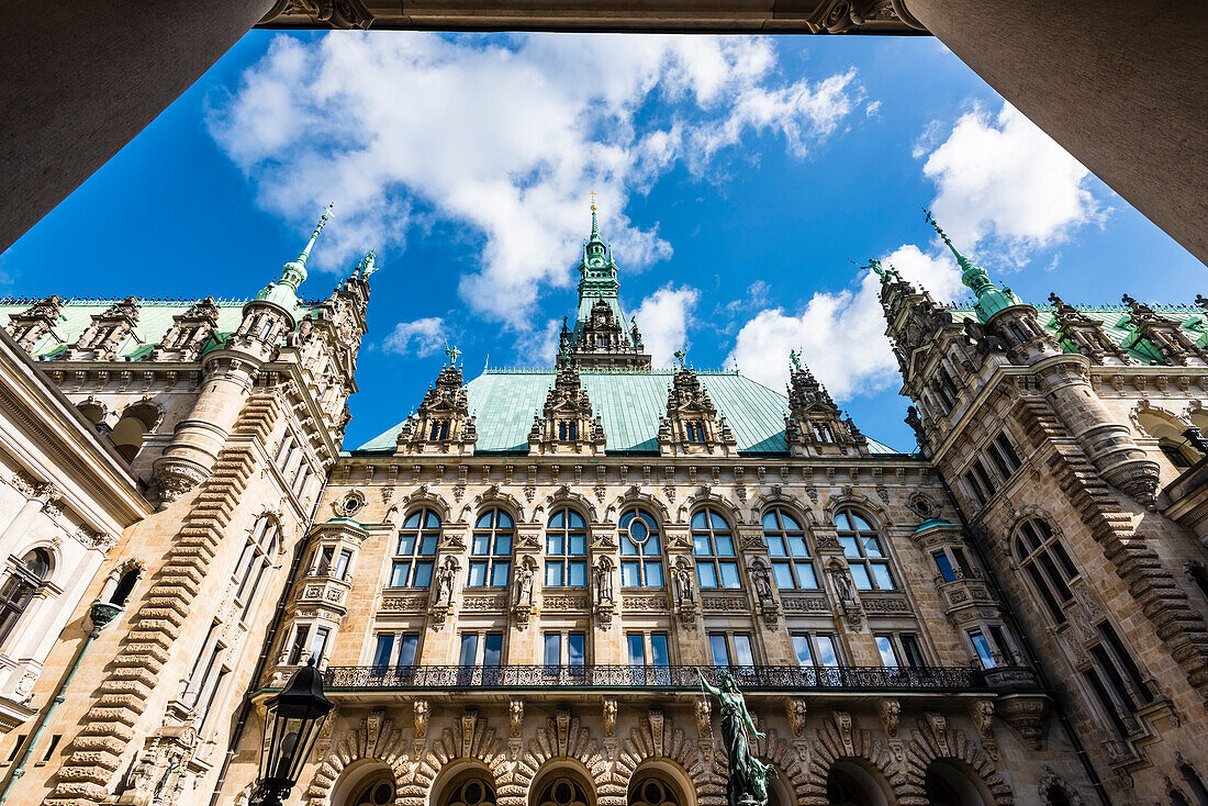 The courtyard in the historical style of the neorenaissance built Hamburg city hall with the (112-m-high) tower, Hamburg, Germany
