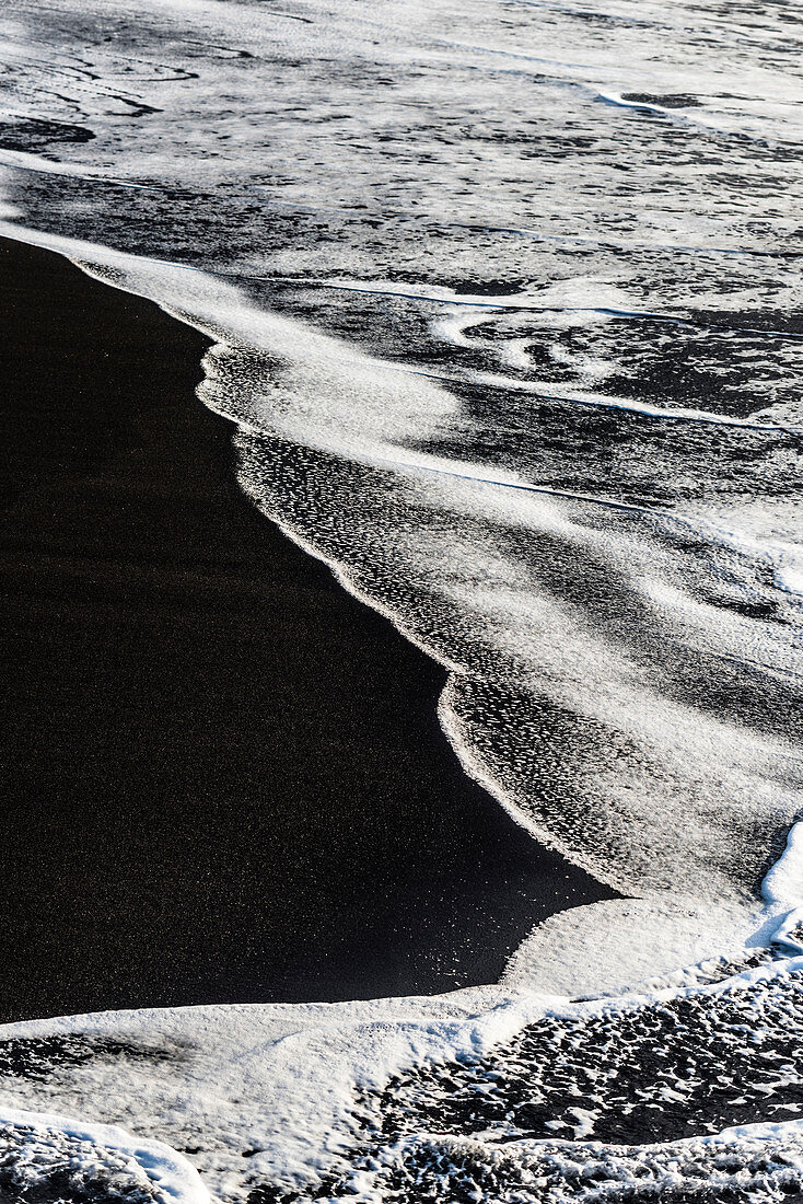 White waves on the beach from volcano rock, Puerto de la Cruz, Tenerife, Canary islands, Spain