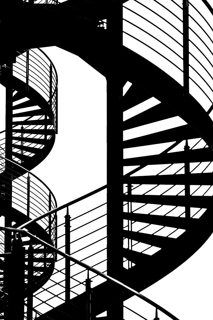 Two spiral staircases as a silhouette, modern architecture in the harbour city, Hamburg, Germany