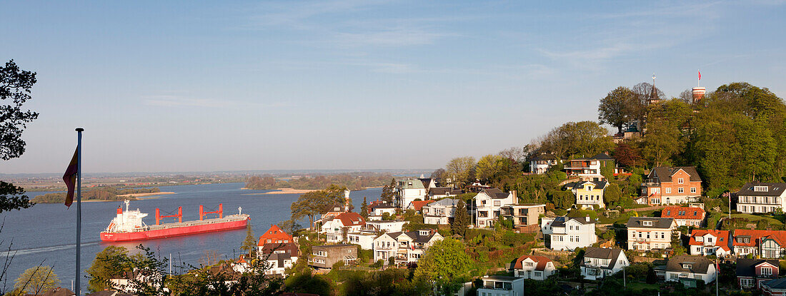 Containership on the Elbe river near Blankenese, Hamburg, Germany