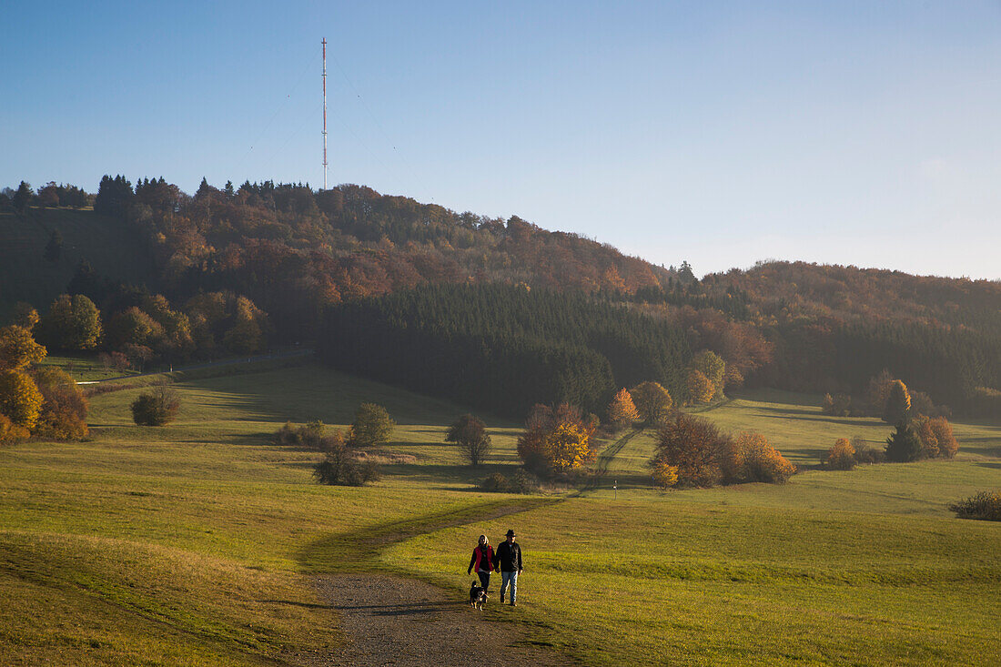 Hikers on path near Kreuzberg mountain