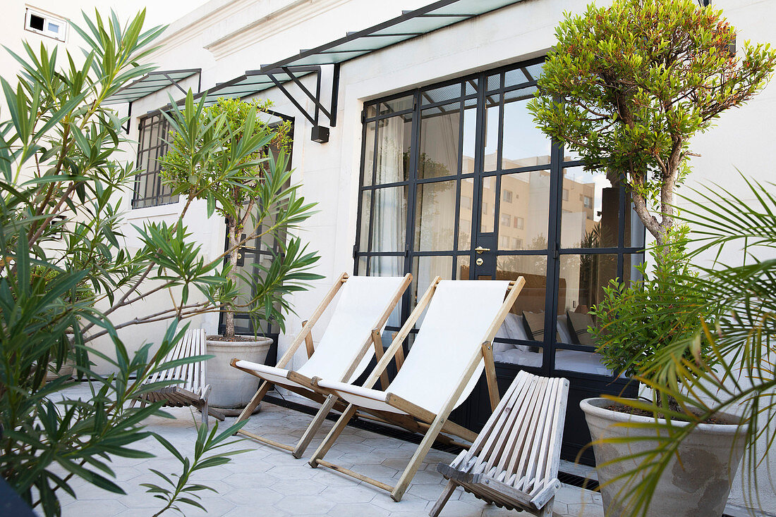 Deckchairs on hotel patio