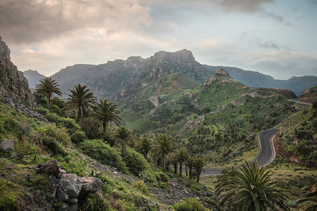 romantic road leading through mountainous landscape around National Park Parque Nacional de Garajonay, La Gomera, Canary Islands, Spain