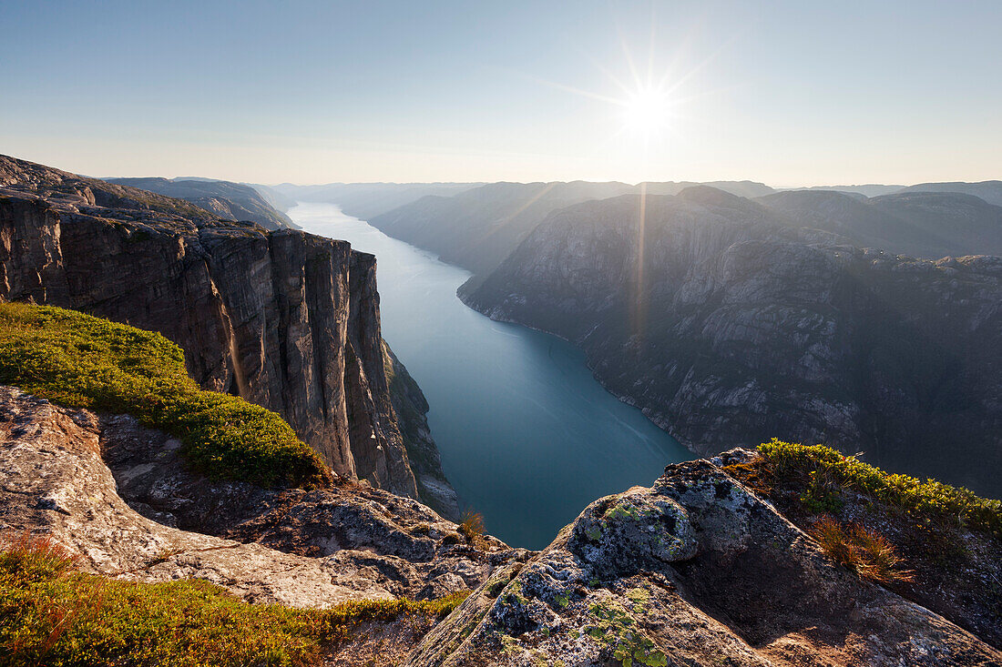 Escarpment of rock plateau Kjerag over 1000 meters above the Lysefjord in summer, Rogaland, Norway, Scandinavia