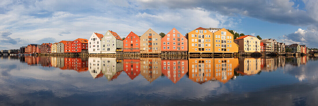 Panorama with colorful storage houses on the banks of the River Nidelva in the old town of Trondheim in the summer, Trondheim, Sør-Trøndelag, Norway, Scandinavia
