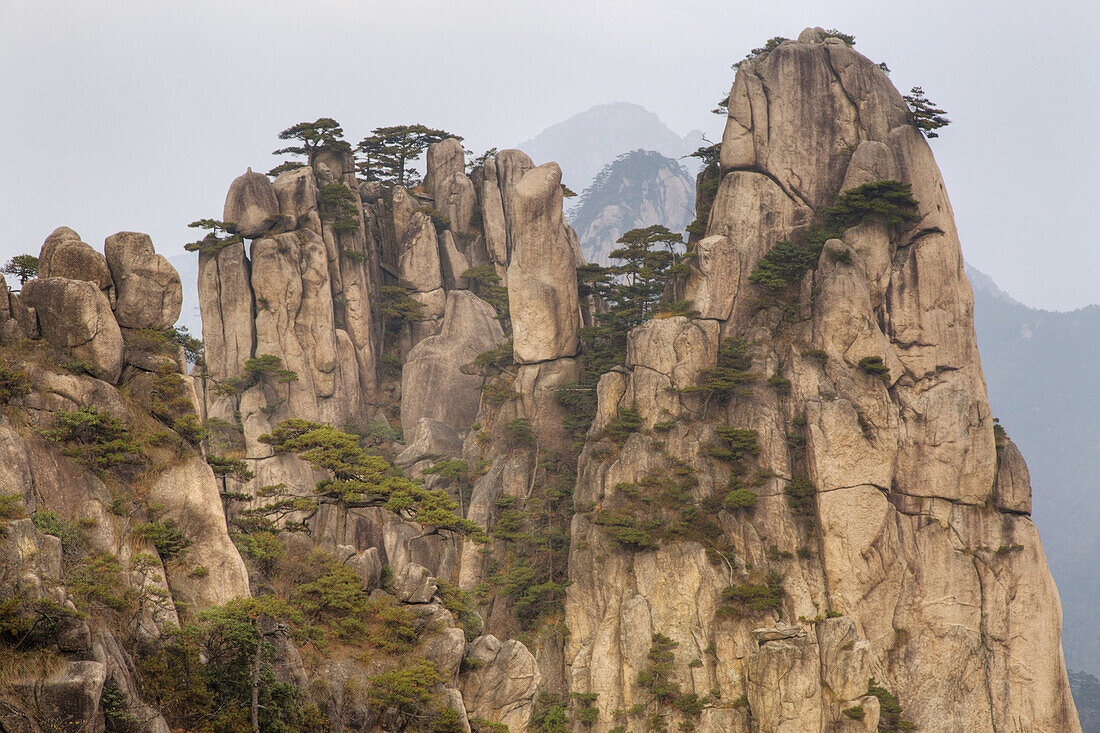 View of mountain range with granite peaks, Huangshan (Yellow Mountains), Anhui Province, China, October