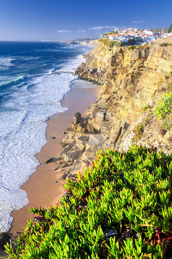 Top view of ocean waves crashing on the high cliffs of Azenhas do Mar, Sintra, Portugal, Europe