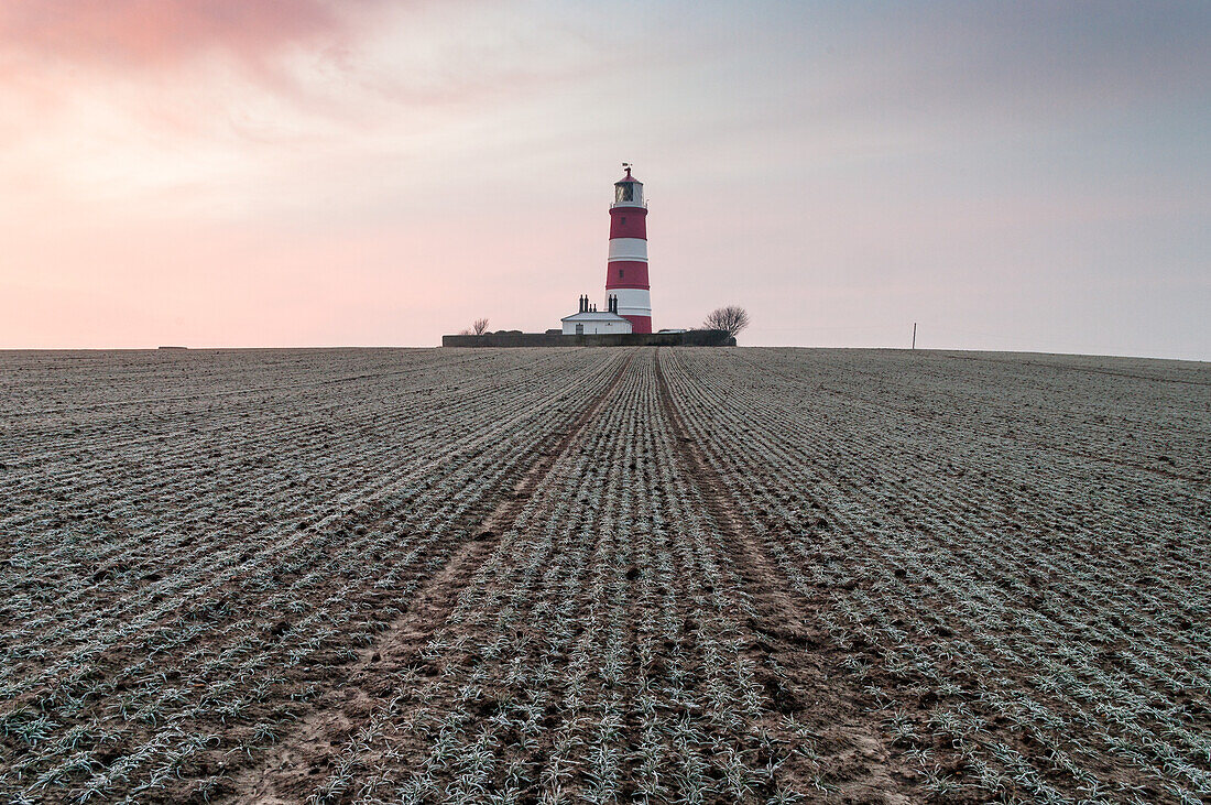 Sunrise at Happisburgh Lighthouse on a frosty morning, Happisburgh, Norfolk, England, United Kingdom, Europe