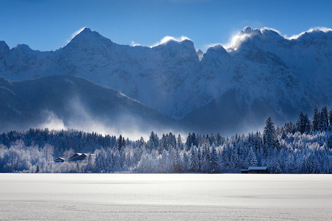 View over the ice at Barmsee to Karwendel range, Bavaria, Germany