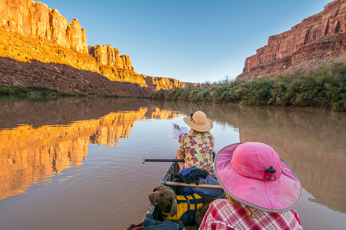 A mother and daughter canoeing along the  Labyrinth Canyon section of the Green RIver, Green River, Utah.