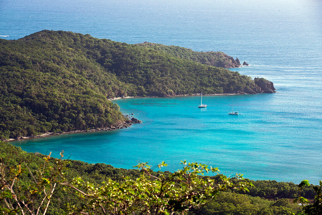 A stunning view overlooking sailing yachts anchored in Great Lameshur Bay, from Bordeaux Mountain trail, St. John, US Virigin Islands.