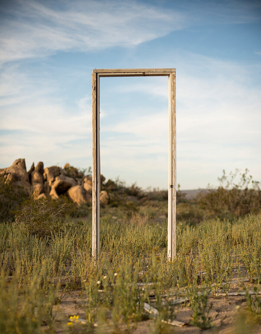 A wooden door frame stands in a field outside of Palmdale, Calif., on March 23, 2014.