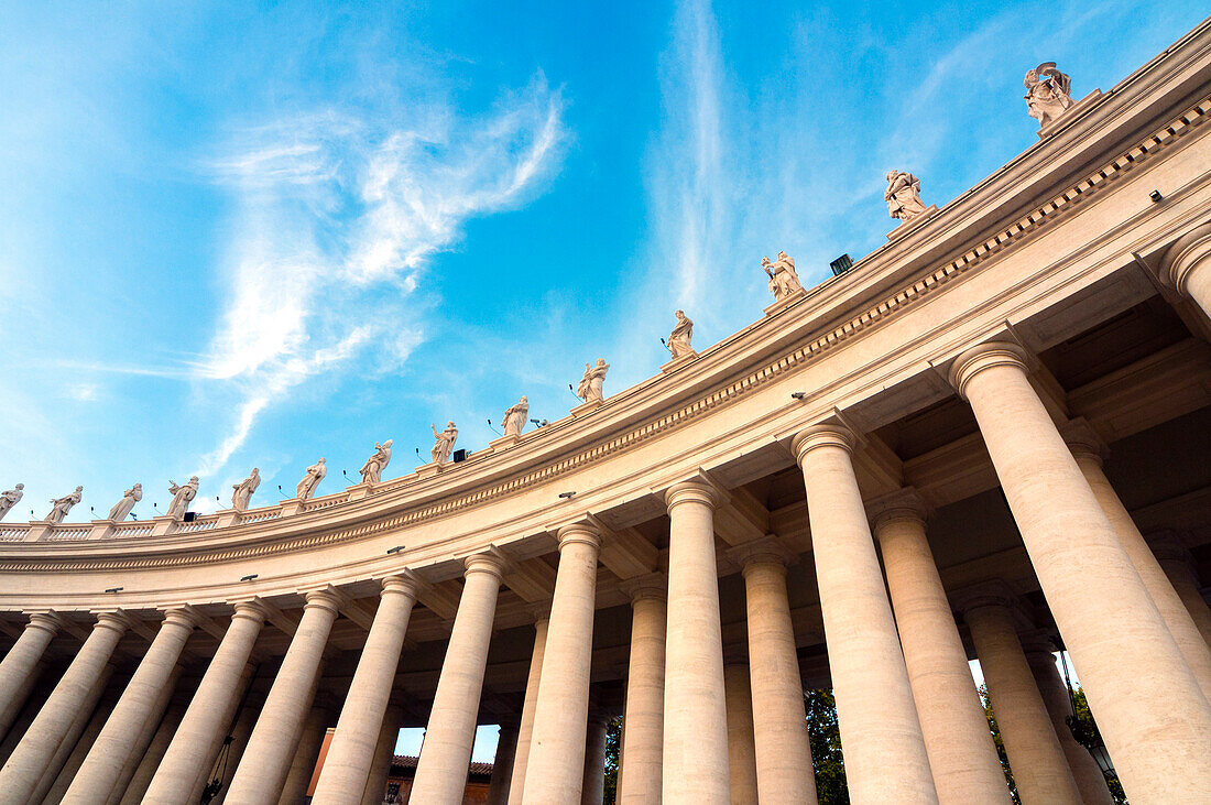 Bernini's 17th century colonnade and statues of saints, St. Peter's Square, Vatican City, UNESCO World Heritage Site, Rome, Lazio, Italy, Europe