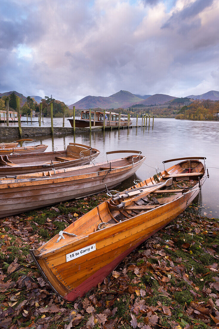 Wooden rowing boats beside Derwent Water in the Lake District National Park, Cumbria, England, United Kingdom, Europe