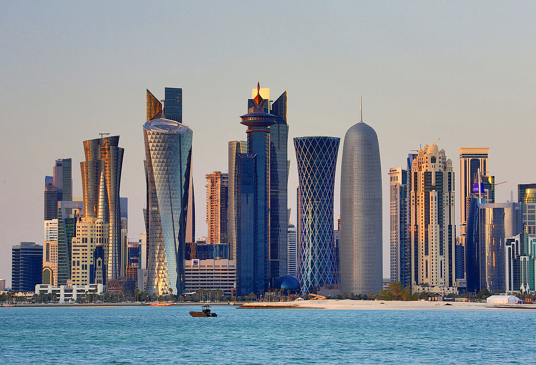 Qatar , Doha City, The Corniche , West Bay Skyline at sunset.