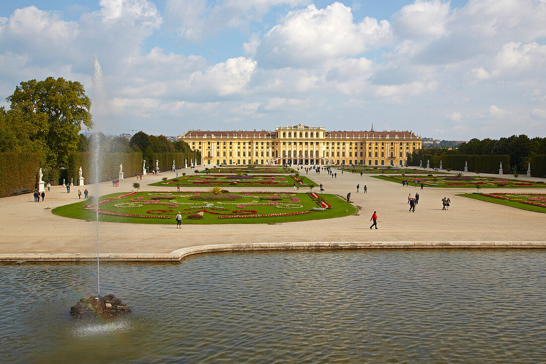 Park of Schönbrunn Castle with well Neptunbrunnen at Vienna on the river Danube , Austria , Europe