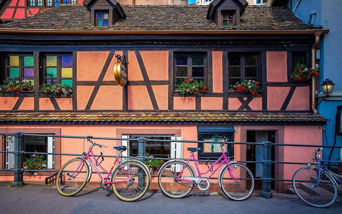 Bikes in front of ancient house La Petite France Strasbourg Alsace France.