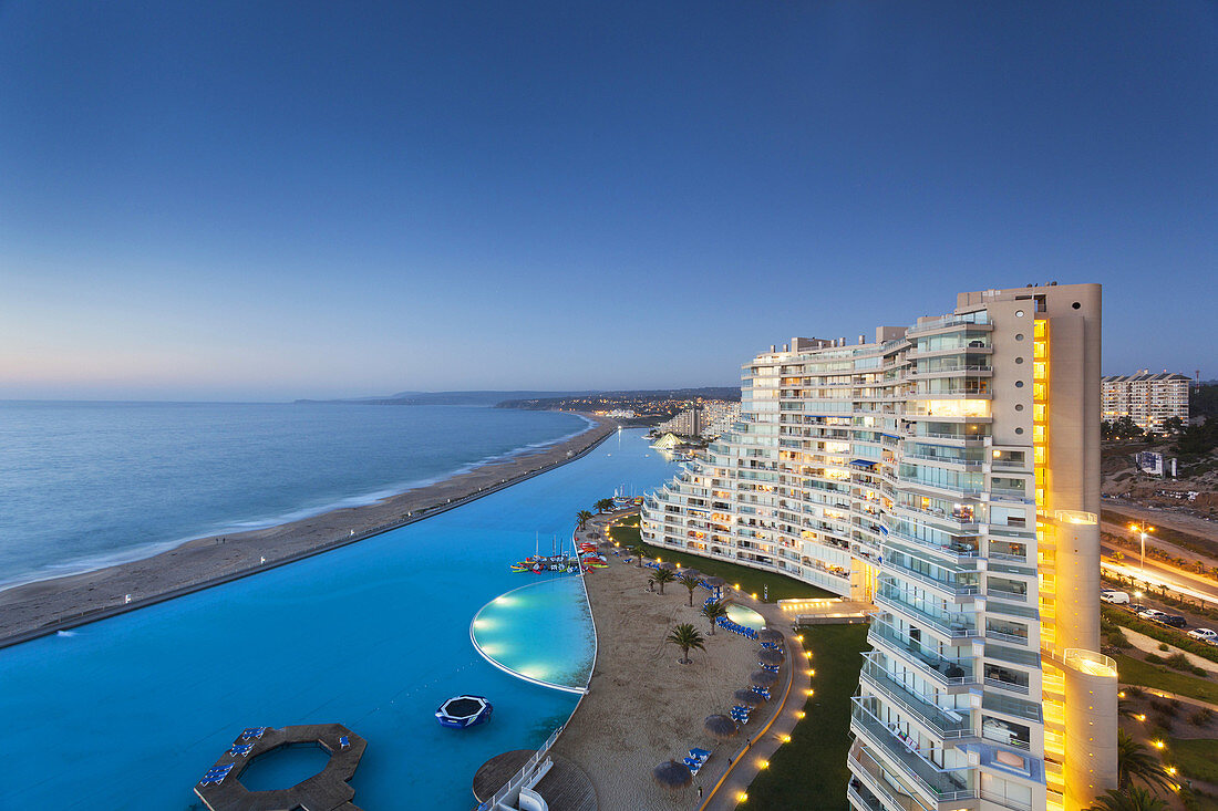 Chile, Algarrobo, San Alfonso del Mar, World´s largest man-made pool, elevated view, dusk.