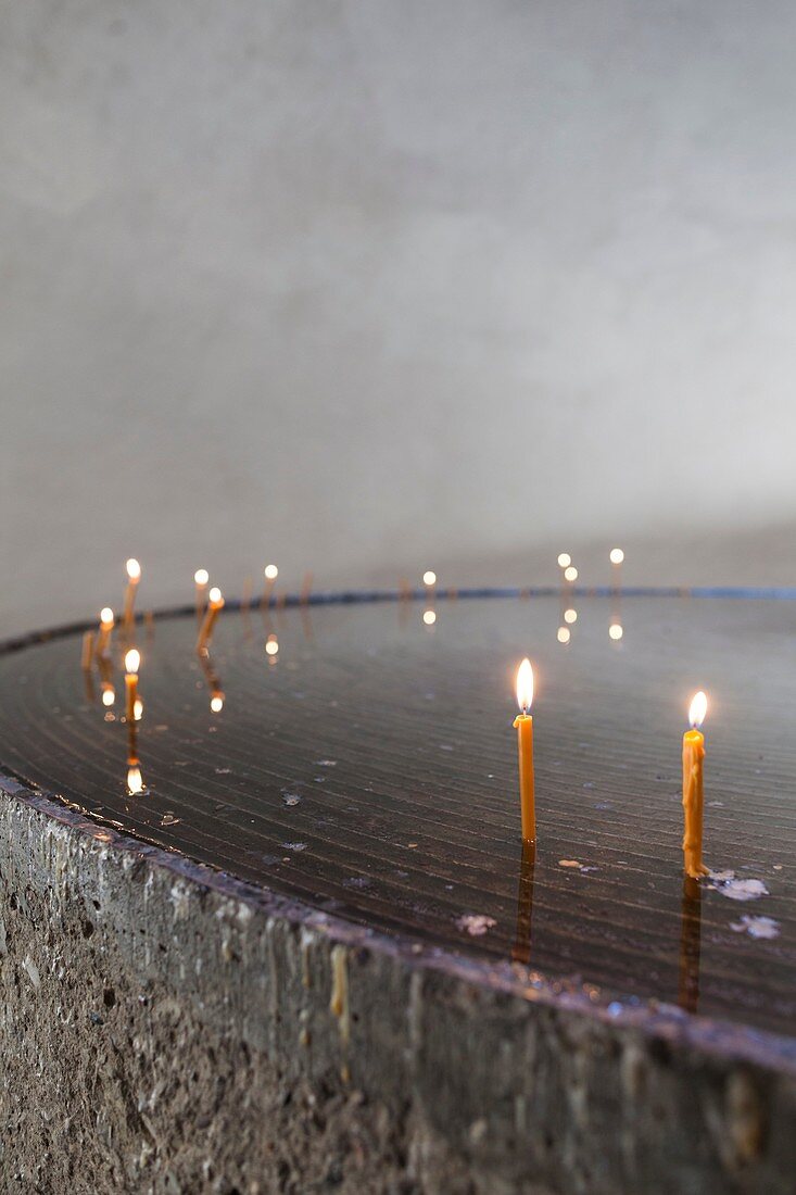 Romania, Maramures Region, Sighetu Marmatei, Memorial to the Victims of Communism and to the Resistance, housed in former political prison, memorial candles.