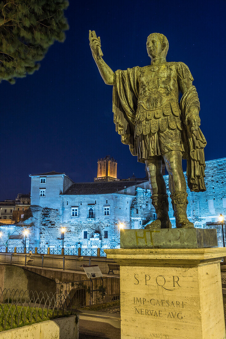 Imperial Forum, Rome, Lazio, Italy. The Statue of Emperor Julius Caesar at night