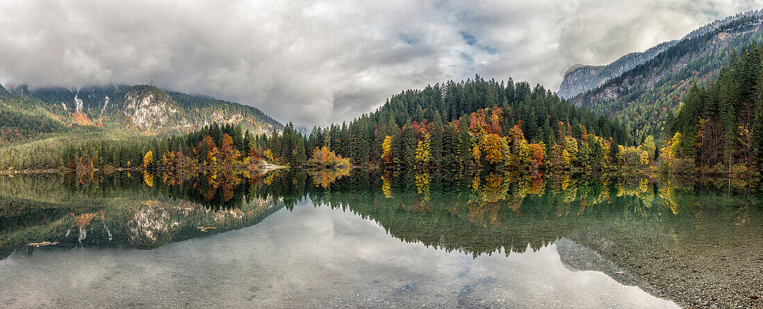 Italy, Trentino Alto Adige, Non valley, autumn reflections at Tovel Lake