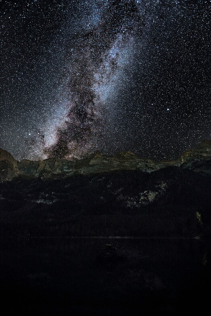 Italy, Trentino Alto Adige, Non valley, starry night over Tovel Lake.
