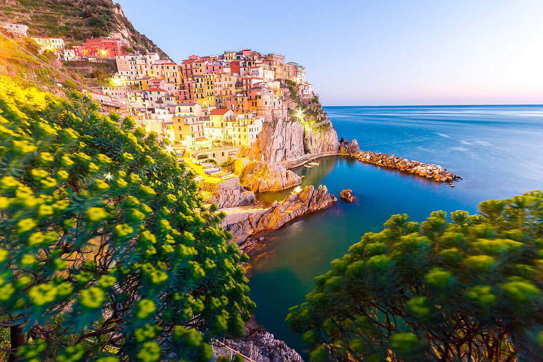 Manarola, Cinque Terre, Liguria, Italy. Sunset over the town, view from a vantage point