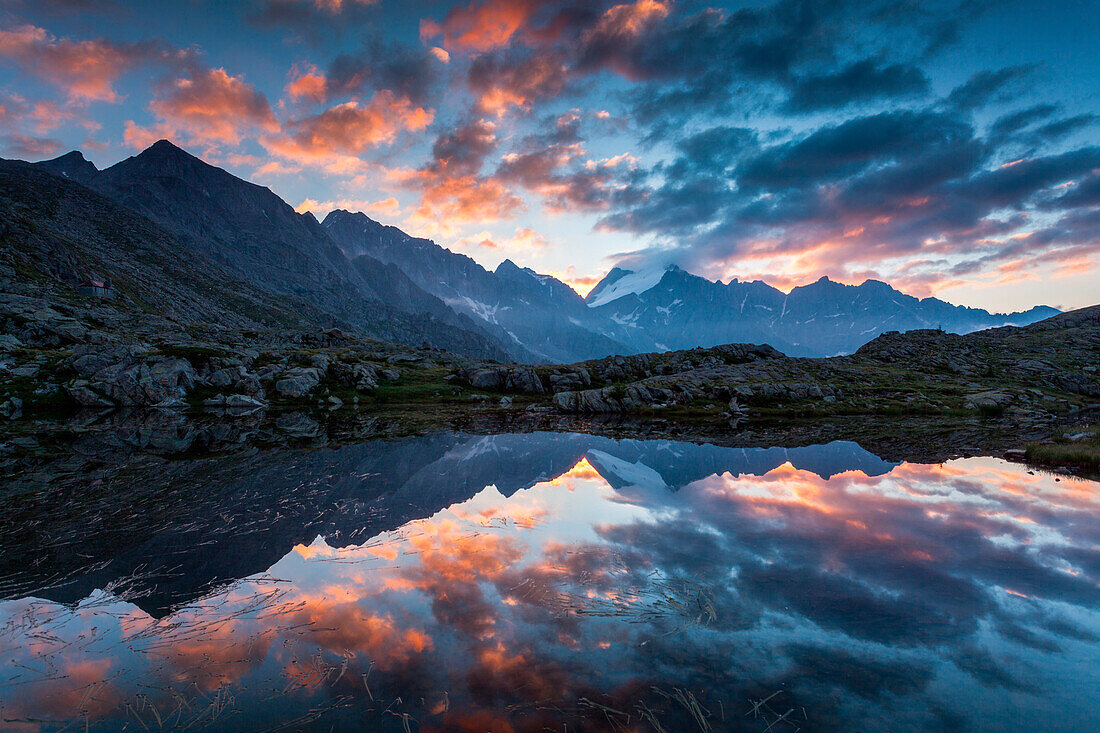 Genova valley, Adamello Brenta natural park, Trentino Alto Adige, Italy. Sunrise from one of the many lakes near the Mandrone refuge