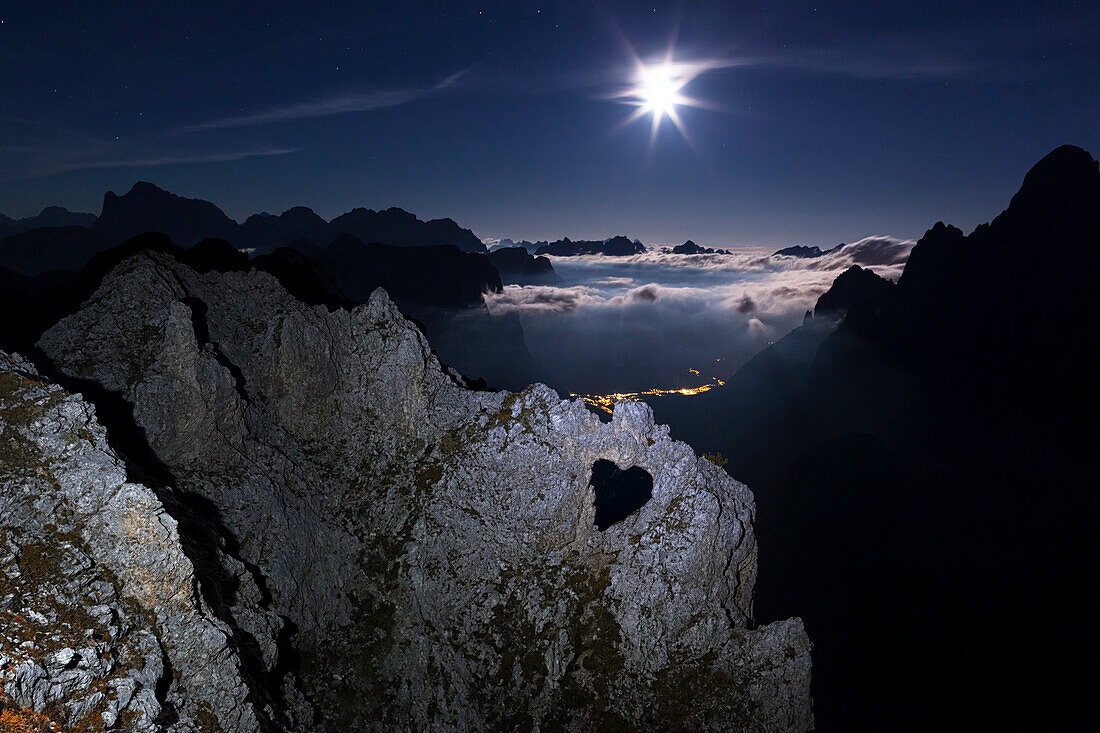 Europe, Italy, Veneto, Belluno, Agordino. A rock's heart between rock walls at night. Pale dei Balconi, Dolomites