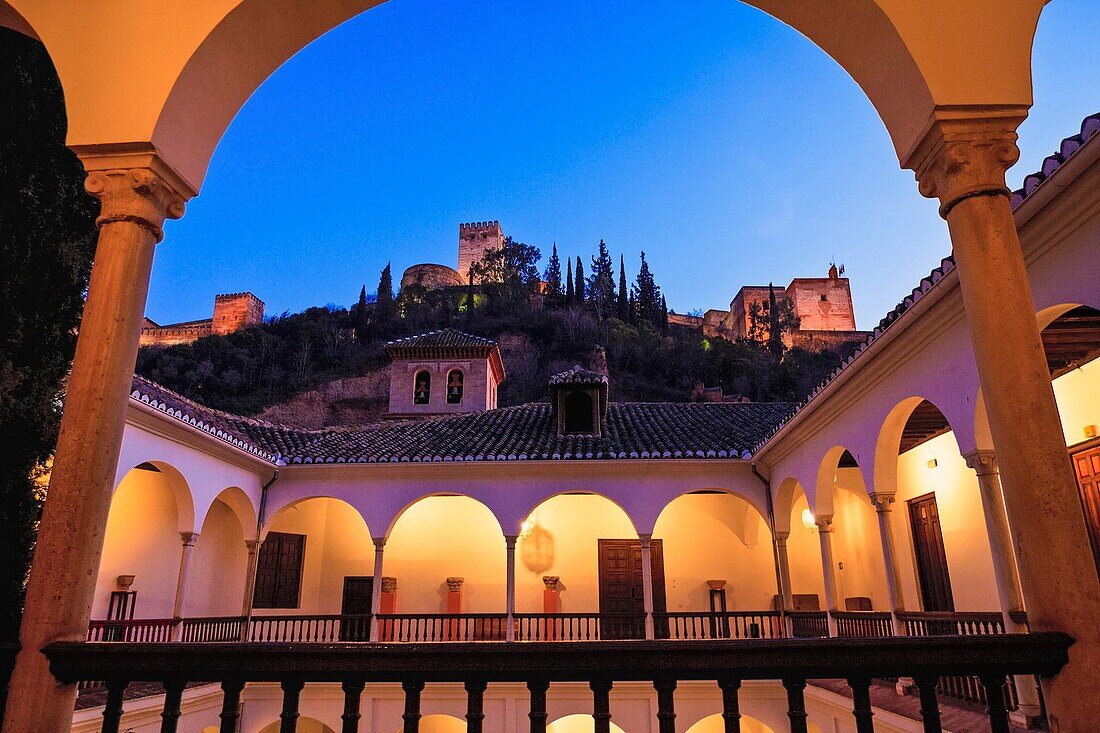 Alhambra seen at dusk from Archeological Museum, Granada, Spain.