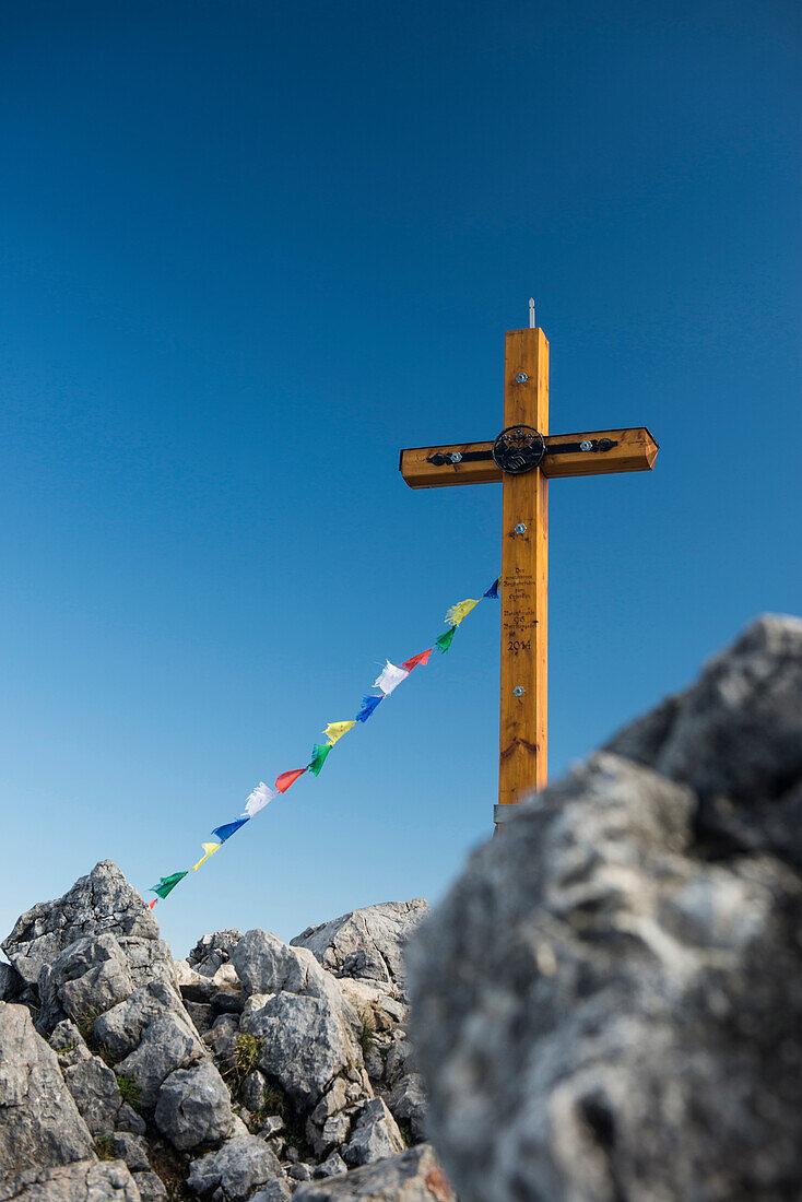 Summit cross and prayer flags at Jenner, National Park Berchtesgaden, Berchtesgadener Land district, Upper Bavaria, Bavaria, Germany