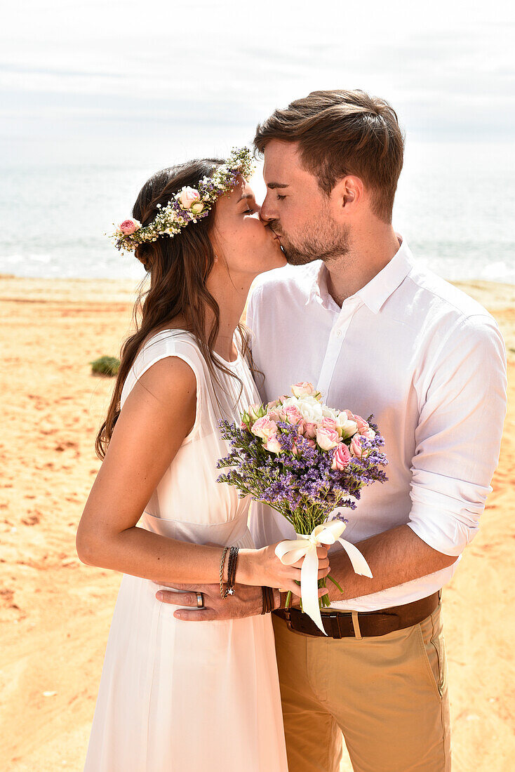 Wedding couple at the beach of  Vale do Lobo, Algarve, Portugal