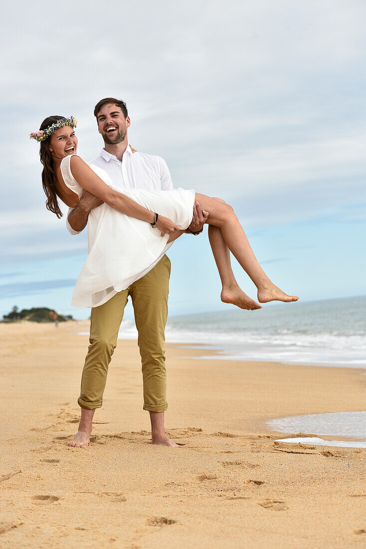 Wedding couple at the beach of  Vale do Lobo, Algarve, Portugal