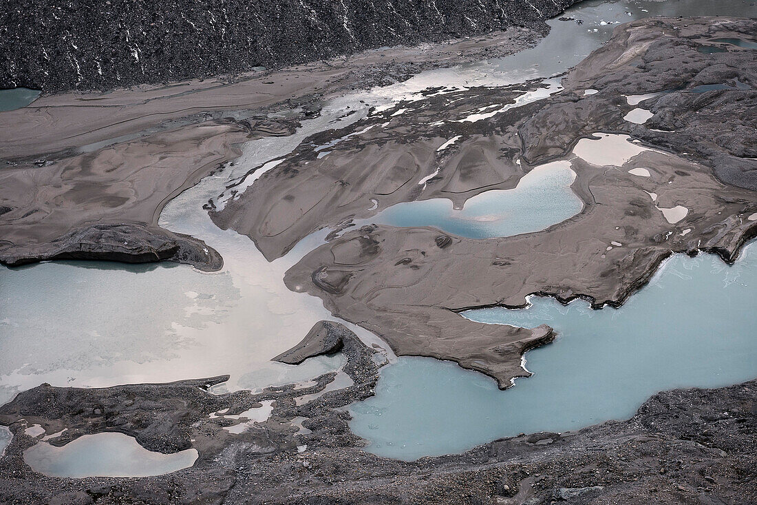 Geröll und Schmelzwasser des Pasterzengletscher, Großglockner Hochalpenstraße, Hohe Tauern in den Alpen, Salzburg / Kärnten, Österreich, Europa