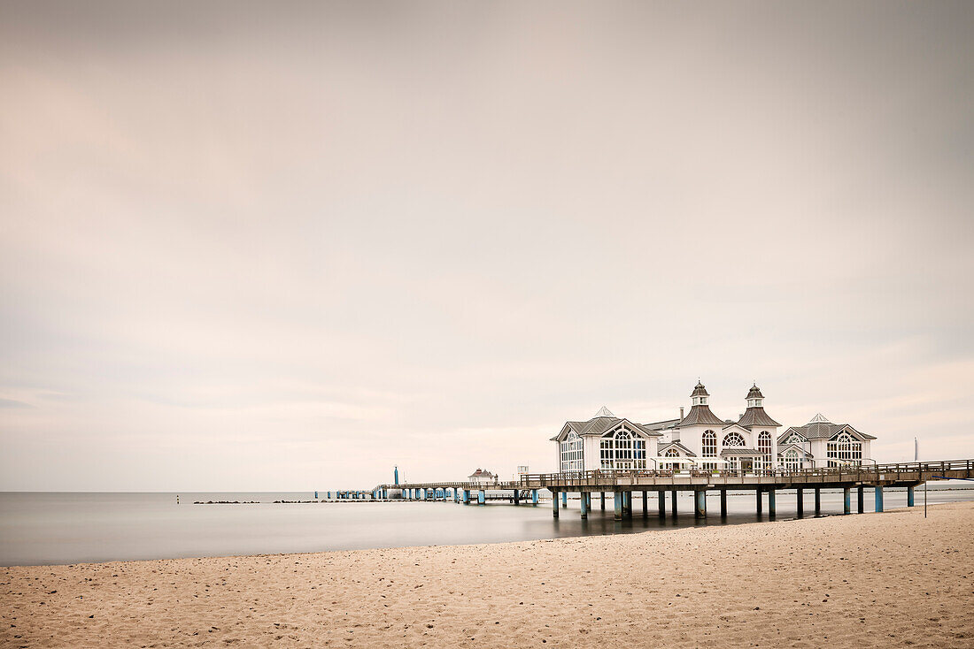 view across beach to Sellin Seaside Bridge, Sellin Baltic Sea coastal resort, Ruegen Island, Mecklenburg-West Pomerania, Germany