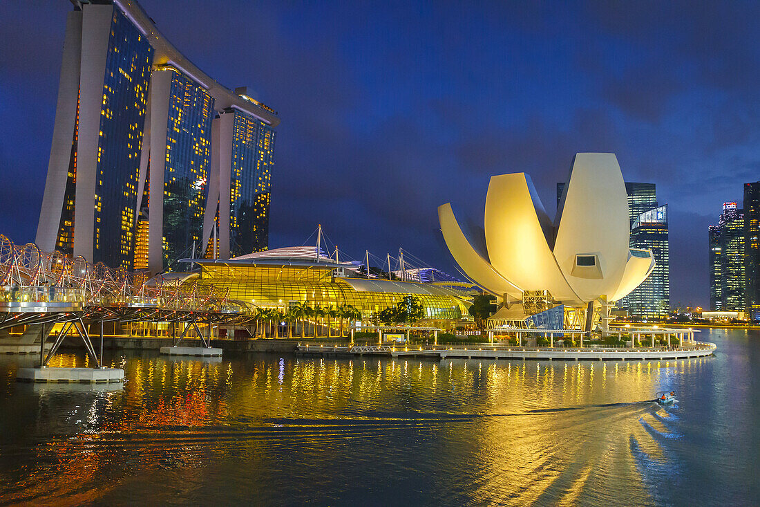 ArtScience Museum and Marina Bay Sands Hotel at night. Singapore, Asia.