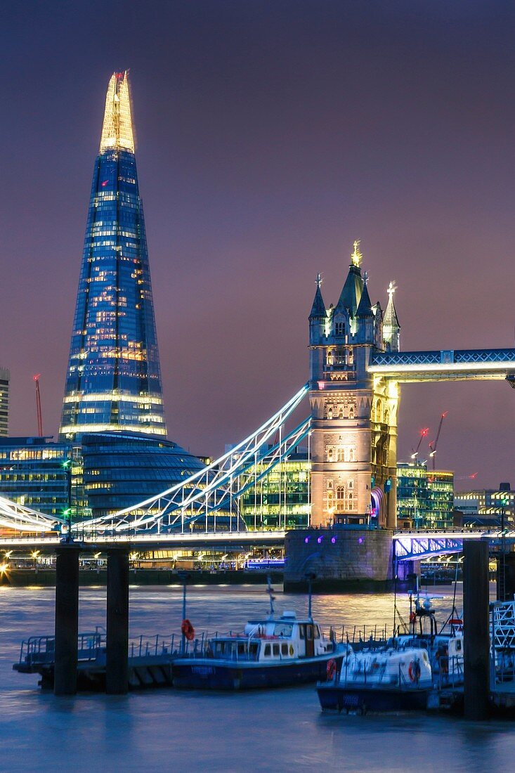 Tower Bridge, River Thames and The Shard skyscraper at night. London, United Kingdom, Europe.