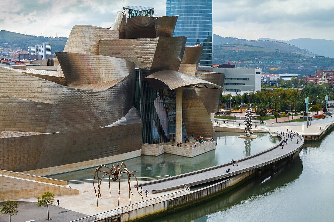 Guggenheim Museum of Art, Nervion river and Iberdrola tower. Bilbao, Biscay, Spain, Europe.