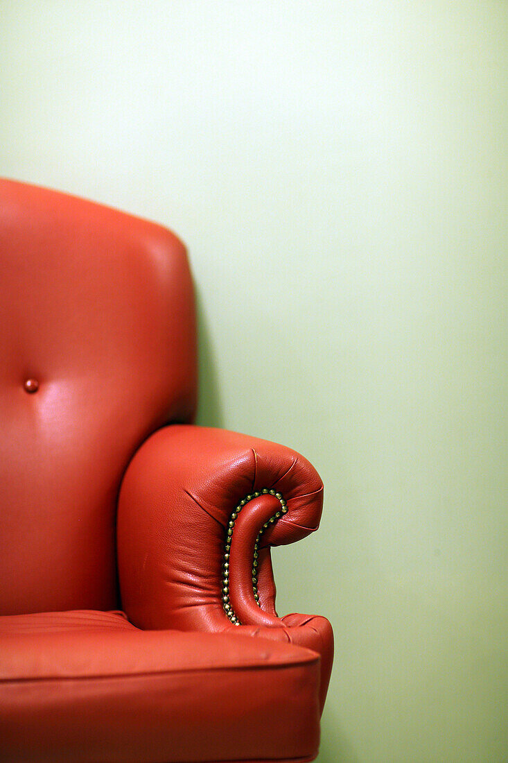 Half image of a leather arm chair, Moscow, Russia, Europe.