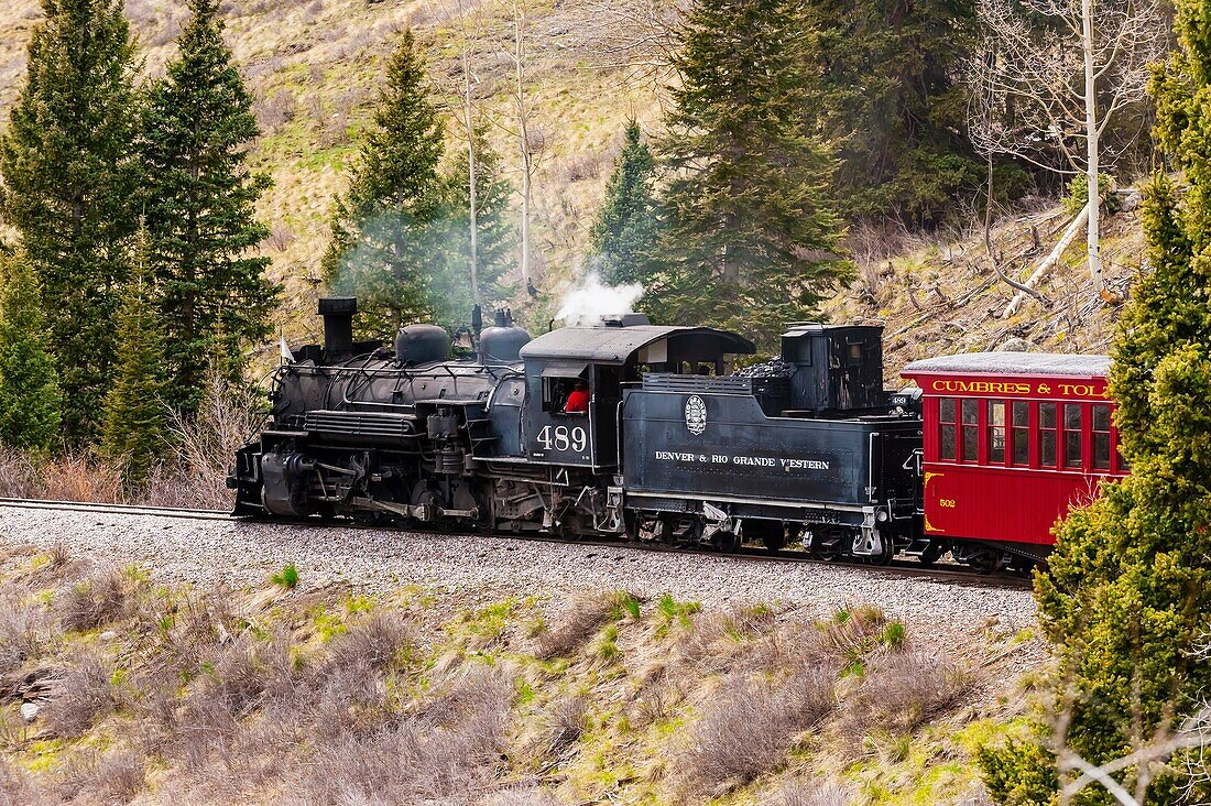 The Cumbres & Toltec Scenic Railroad train on the 64 mile run between Antonito, Colorado and Chama, New Mexico. The narrow gauge track is 3 feet wide. Here it is passing over 10,015 ft (3,053 m) Cumbres Pass.