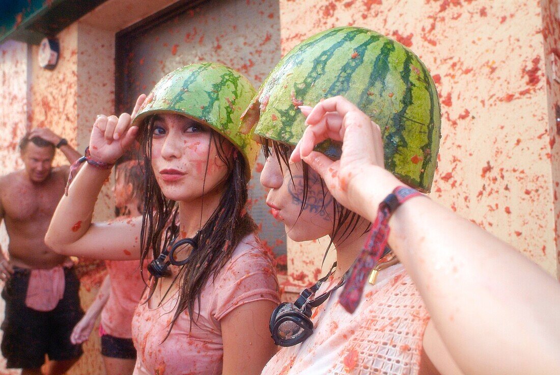 150 tons of tomatoes serve as ammunition for traditional Tomatina, a battle which attracted this year more than 22,000 people of 96 different nationalities to launch a record number tomatoes. Buñol, Valencia province, Spain.