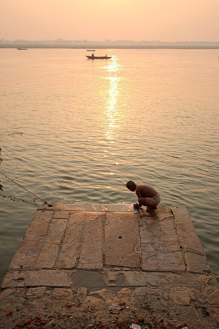 Bathers in the Ganges early in the morning at one of the ghats of Varanasi.