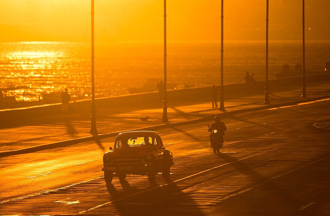 The Malecon at Sunset in Havana, Cuba.