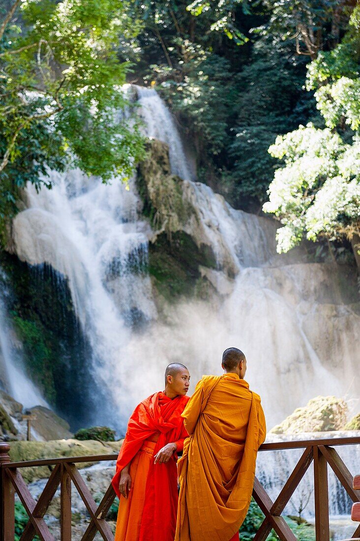 Asia. South-East Asia. Laos. Province of Luang Prabang. Monks at Kuang Si Waterfall.