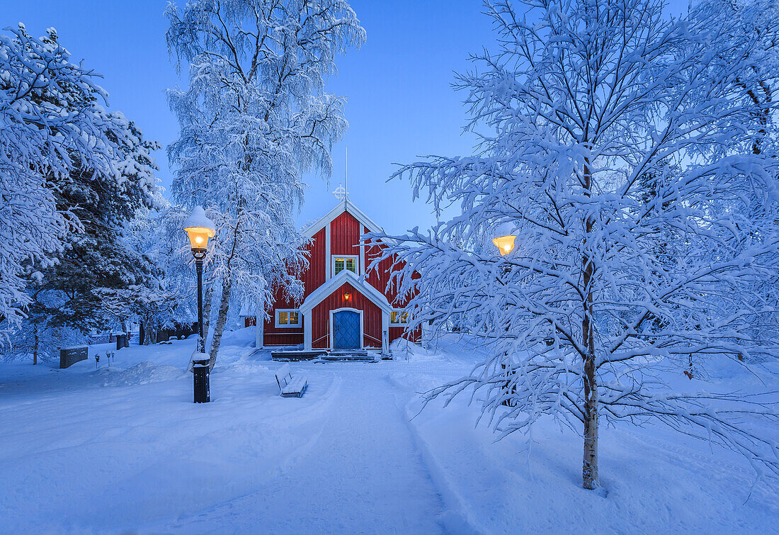 Small Wooden Church in Jukkasjarvi. Sweden. Cold winter with temperatures as low as -47 celsius. Lapland, Sweden.