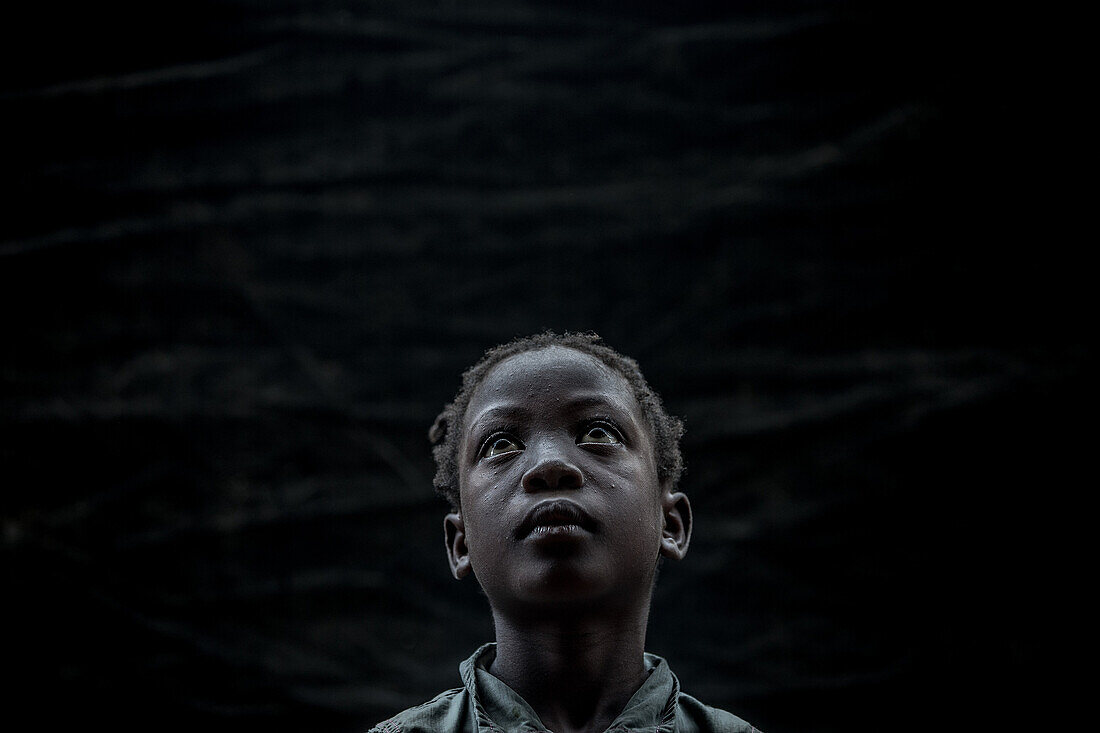 Little child looking in the air, Sao Tome, Sao Tome and Principe, Africa