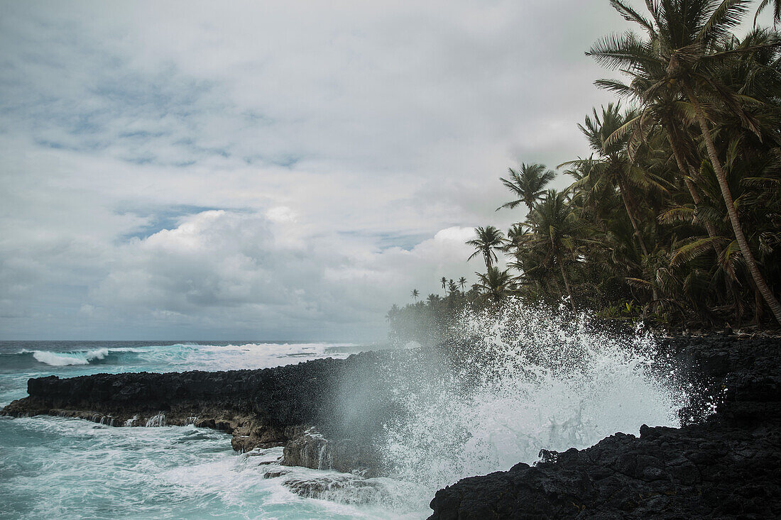 Waves hitting against rocks, Sao Tome, Sao Tome and Principe, Africa