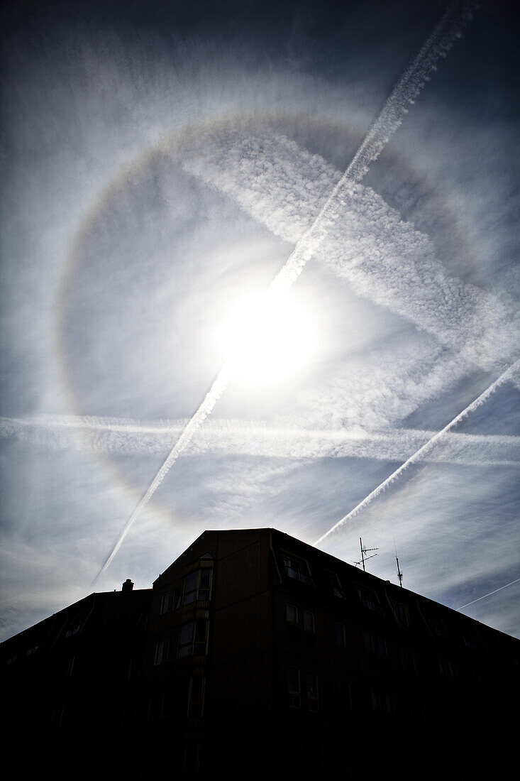 Rainbow circled halo around the sun in Berlin, Germany.